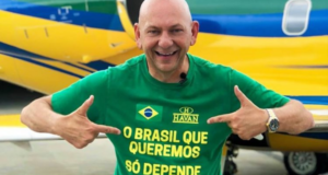 O STF derruba indenização de Luciano Hang contra o jornalista Luis Nassif. Luciano Hang aparece sorrindo em foto com camisa verde e amarela.